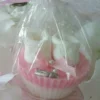 Cupcake met sloffen zeepje in roze verpakt in folie