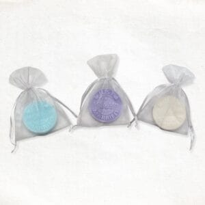 Stamp with text just married soap in an organza bag